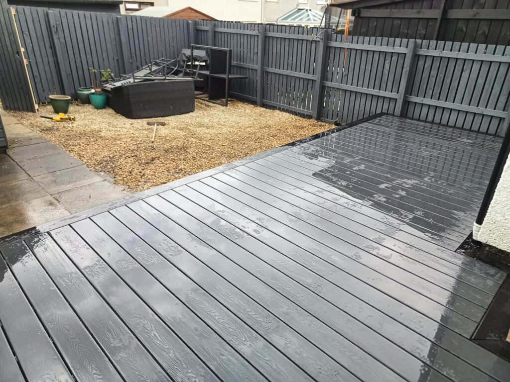 Full exterior deck installation completed in Edinburgh — composite boards and integrated steps